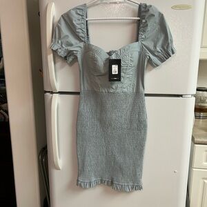 Cowboy Mini Dress
Size M 
Light Denim Blue
NWT
5 Star Seller